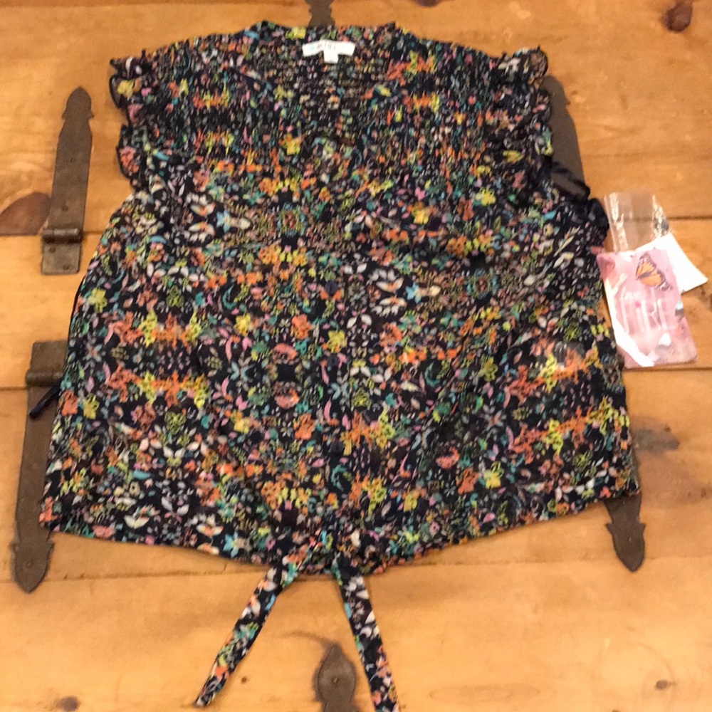 Very light and pretty top.